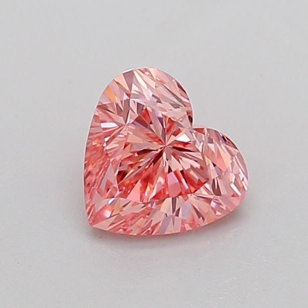 Loose Diamond - HEART 0.7ct Fancy Vivid Pink VS2: Loose Diamond - HEART 0.7ct Fancy Vivid Pink VS2 Source: This is a real non-mined Diamond that has been grown in a lab Shape: HEART Carats: 0.7 Color: Fancy Vivid Pink Certification: IGI Video: