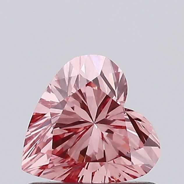 Loose Diamond - HEART 0.7ct Fancy Vivid Pink VS1: Loose Diamond - HEART 0.7ct Fancy Vivid Pink VS1 Source: This is a real non-mined Diamond that has been grown in a lab Shape: HEART Carats: 0.7 Color: Fancy Vivid Pink Certification: IGI Video: