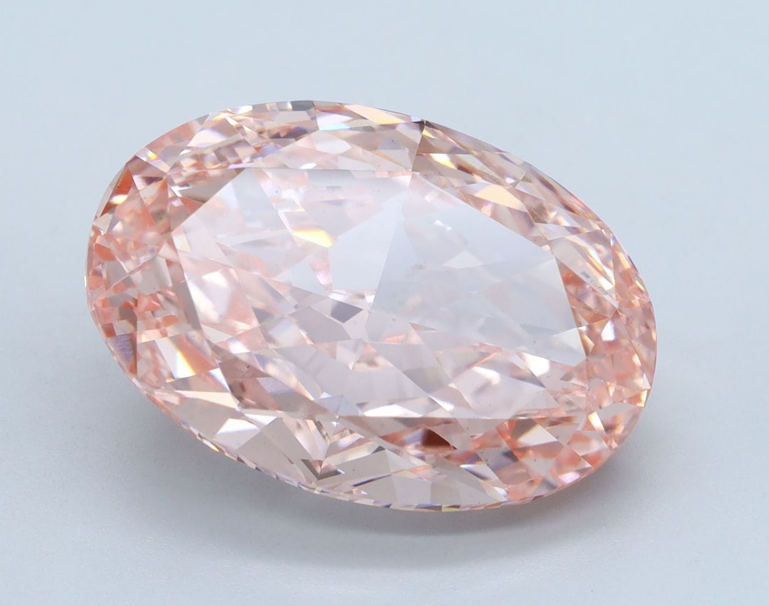 Loose Diamond - OVAL 11.53ct Fancy Vivid Pink VS1: Loose Diamond - OVAL 11.53ct Fancy Vivid Pink VS1 Source: This is a real non-mined Diamond that has been grown in a lab Shape: OVAL Carats: 11.53 Color: Fancy Vivid Pink Certification: IGI Video: