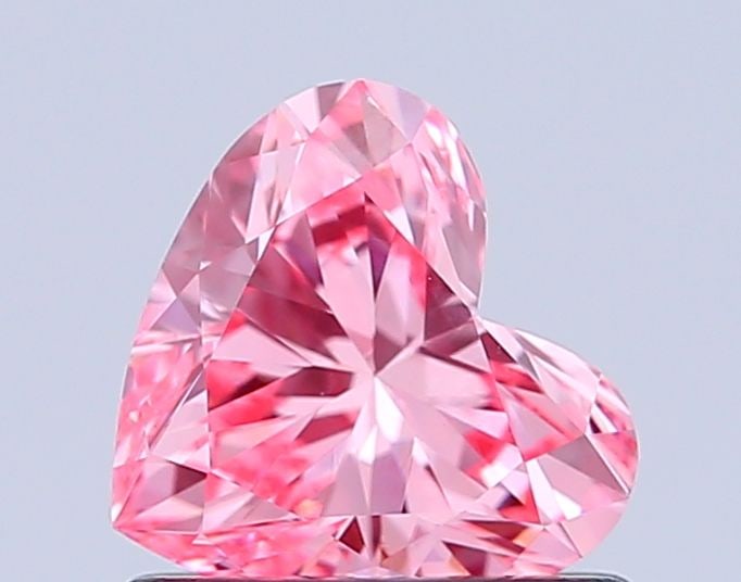 Loose Diamond - HEART 0.76ct Fancy Vivid Pink VVS2: Loose Diamond - HEART 0.76ct Fancy Vivid Pink VVS2 Source: This is a real non-mined Diamond that has been grown in a lab Shape: HEART Carats: 0.76 Color: Fancy Vivid Pink Certification: IGI Video: