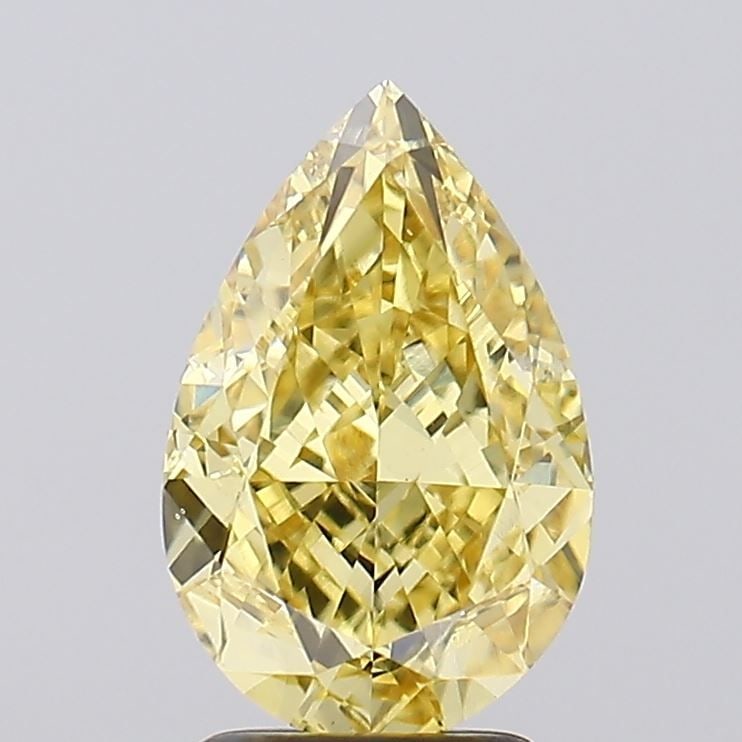 Loose Diamond - PEAR 3.02ct Fancy Vivid Yellow VS1: Loose Diamond - PEAR 3.02ct Fancy Vivid Yellow VS1 Source: This is a real non-mined Diamond that has been grown in a lab Shape: PEAR Carats: 3.02 Color: Fancy Vivid Yellow Certification: IGI Video: