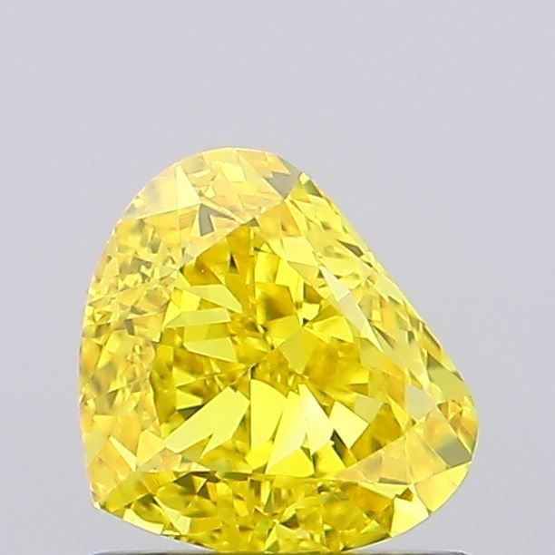 Loose Diamond - HEART 0.97ct Fancy Vivid Yellow VS1: Loose Diamond - HEART 0.97ct Fancy Vivid Yellow VS1 Source: This is a real non-mined Diamond that has been grown in a lab Shape: HEART Carats: 0.97 Color: Fancy Vivid Yellow Certification: NONE Video: