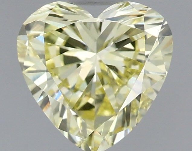 Loose Diamond - HEART 0.75ct Fancy Yellow VS1: Loose Diamond - HEART 0.75ct Fancy Yellow VS1 Source: This is a real non-mined Diamond that has been grown in a lab Shape: HEART Carats: 0.75 Color: Fancy Yellow Certification: IGI PLEASE NOTE: Framed