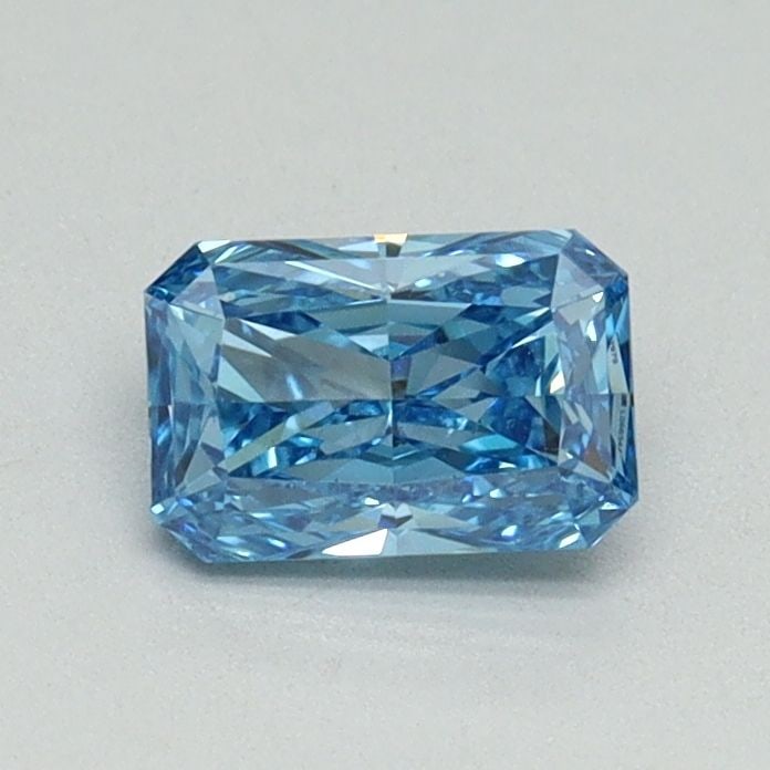 Loose Diamond - RADIANT 0.56ct Fancy Vivid Blue VVS2: Loose Diamond - RADIANT 0.56ct Fancy Vivid Blue VVS2 Source: This is a real non-mined Diamond that has been grown in a lab Shape: RADIANT Carats: 0.56 Color: Fancy Vivid Blue Certification: IGI Video: