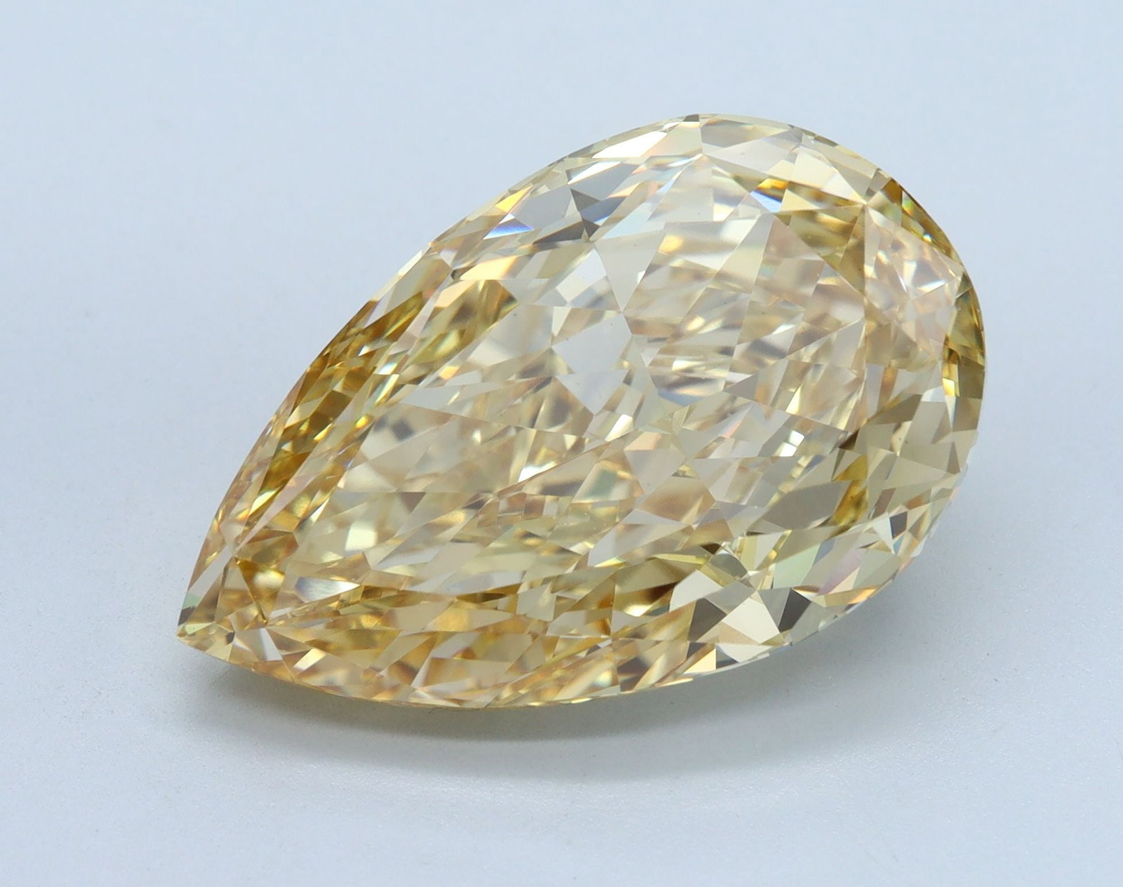 Loose Diamond - PEAR 11.26ct Fancy Intense Yellow VVS2: Loose Diamond - PEAR 11.26ct Fancy Intense Yellow VVS2 Source: This is a real non-mined Diamond that has been grown in a lab Shape: PEAR Carats: 11.26 Color: Fancy Intense Yellow Certification: IGI Vi