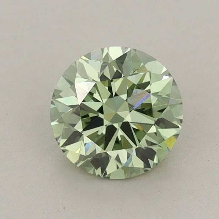 Ideal Loose Diamond - ROUND 0.79ct Fancy Vivid Green VS1: Ideal Loose Diamond - ROUND 0.79ct Fancy Vivid Green VS1 Source: This is a real non-mined Diamond that has been grown in a lab Shape: ROUND Carats: 0.79 Color: Fancy Vivid Green Certification: IGI Vid