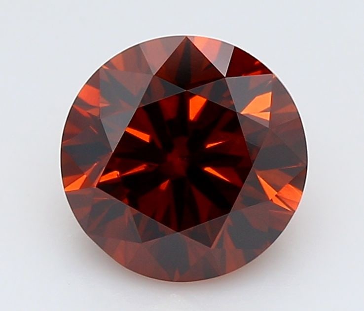 Loose Diamond - ROUND 0.95ct Fancy Orange VVS2: Loose Diamond - ROUND 0.95ct Fancy Orange VVS2 Source: This is a real non-mined Diamond that has been grown in a lab Shape: ROUND Carats: 0.95 Color: Fancy Orange Certification: IGI Video: