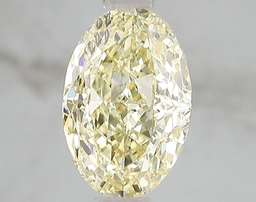 Loose Diamond - OVAL 2.01ct Fancy Intense Yellow VS1: Loose Diamond - OVAL 2.01ct Fancy Intense Yellow VS1 Source: This is a real non-mined Diamond that has been grown in a lab Shape: OVAL Carats: 2.01 Color: Fancy Intense Yellow Certification: IGI Video