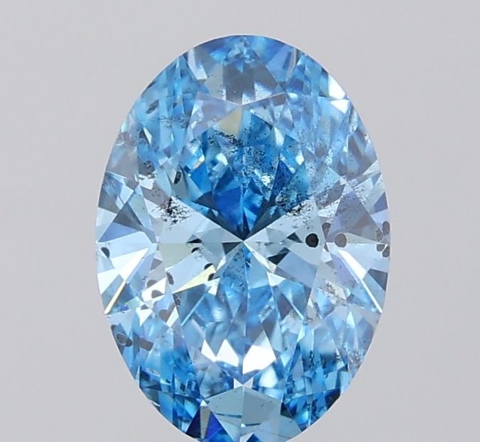 Loose Diamond - OVAL 1.56ct Fancy Vivid Blue SI2: Loose Diamond - OVAL 1.56ct Fancy Vivid Blue SI2 Source: This is a real non-mined Diamond that has been grown in a lab Shape: OVAL Carats: 1.56 Color: Fancy Vivid Blue Certification: IGI Video: