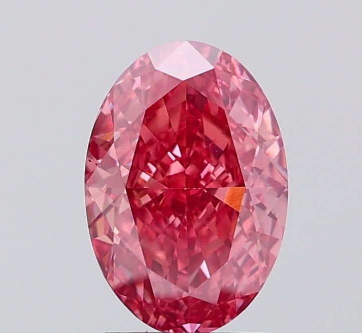 Loose Diamond - OVAL 2.1ct Fancy Vivid Pink VS2: Loose Diamond - OVAL 2.1ct Fancy Vivid Pink VS2 Source: This is a real non-mined Diamond that has been grown in a lab Shape: OVAL Carats: 2.1 Color: Fancy Vivid Pink Certification: IGI Video: