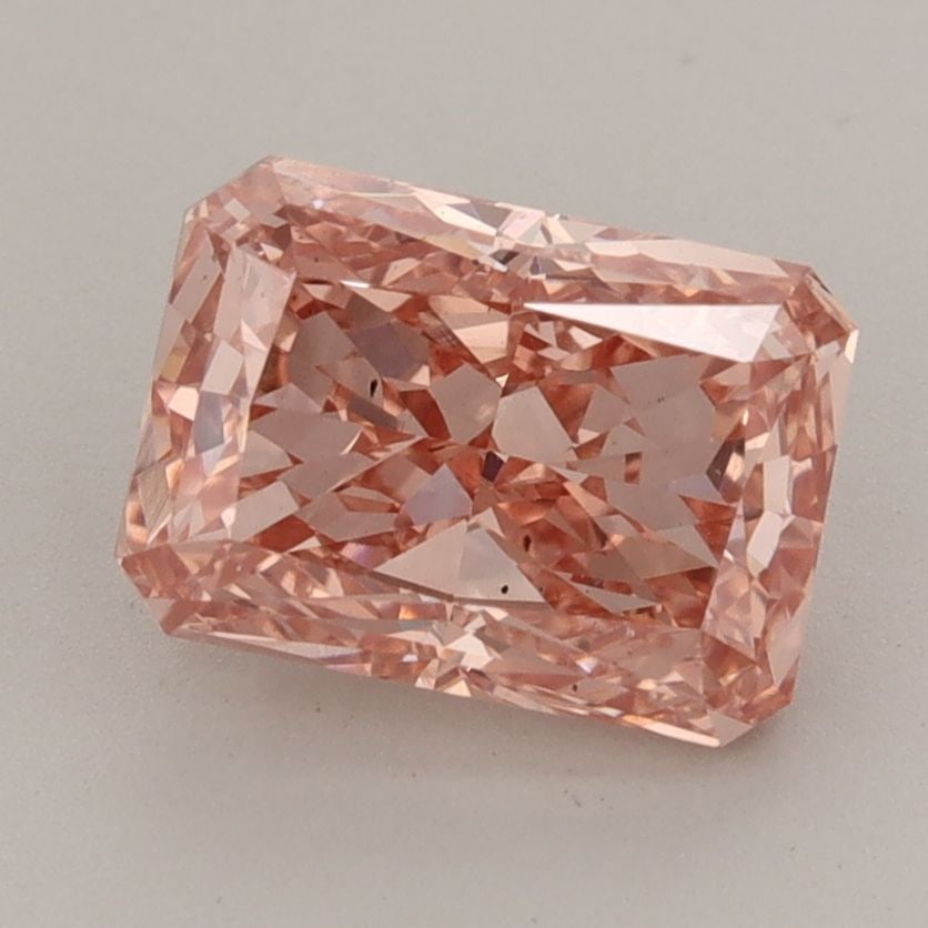 Loose Diamond - RADIANT 2.08ct Fancy Vivid Orangey Pink VS2: Loose Diamond - RADIANT 2.08ct Fancy Vivid Orangey Pink VS2 Source: This is a real non-mined Diamond that has been grown in a lab Shape: RADIANT Carats: 2.08 Color: Fancy Vivid Orangey Pink Certificat