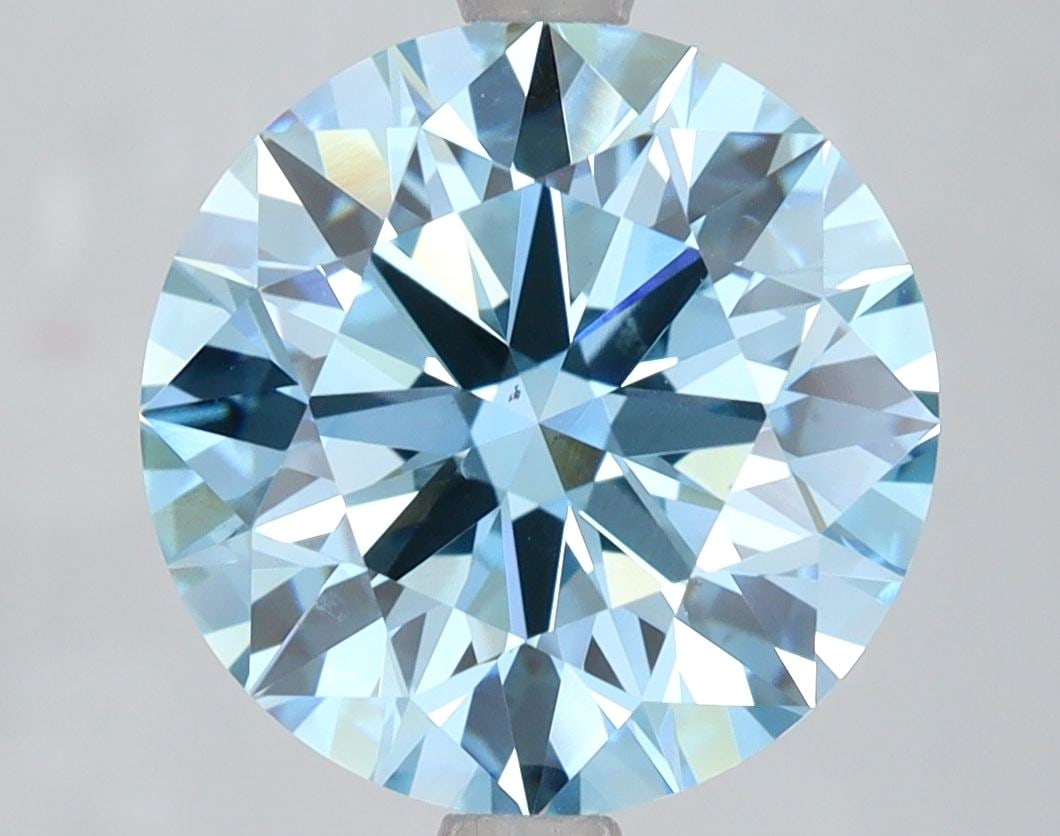 Ideal Loose Diamond - ROUND 4.62ct Fancy Vivid Blue VS1: Ideal Loose Diamond - ROUND 4.62ct Fancy Vivid Blue VS1 Source: This is a real non-mined Diamond that has been grown in a lab Shape: ROUND Carats: 4.62 Color: Fancy Vivid Blue Certification: IGI Video