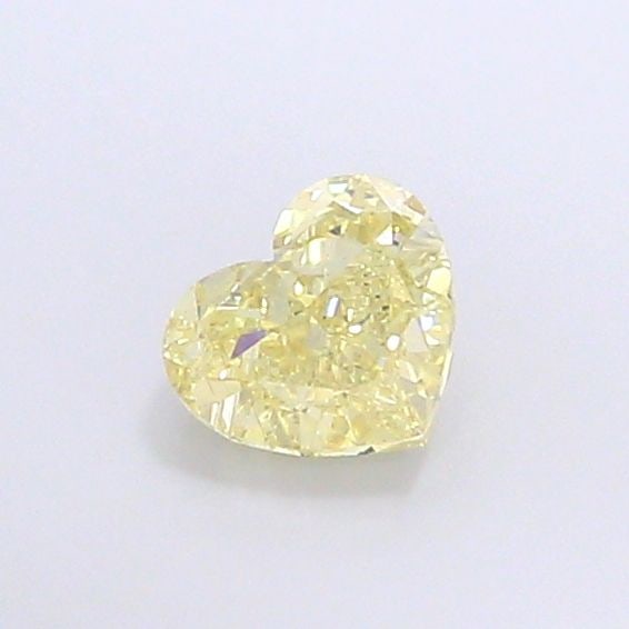 Loose Diamond - HEART 1.1ct Fancy Yellow VS2: Loose Diamond - HEART 1.1ct Fancy Yellow VS2 Source: This is a real non-mined Diamond that has been grown in a lab Shape: HEART Carats: 1.1 Color: Fancy Yellow Certification: IGI Video: