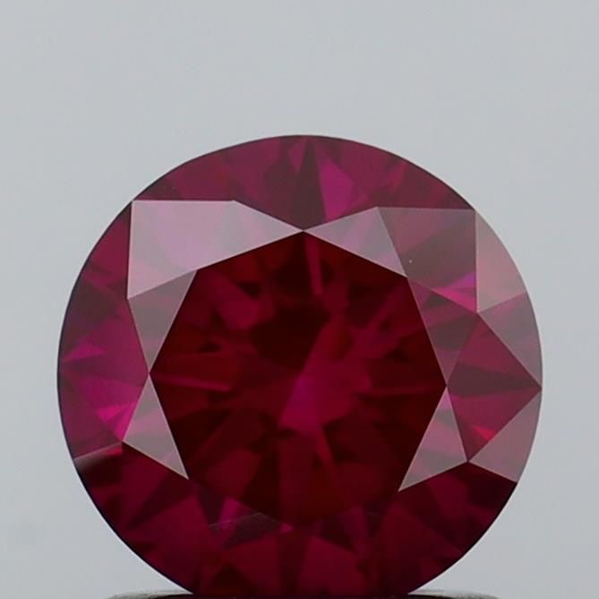 Loose Diamond - ROUND 1.02ct Fancy Vivid Pink VS1: Loose Diamond - ROUND 1.02ct Fancy Vivid Pink VS1 Source: This is a real non-mined Diamond that has been grown in a lab Shape: ROUND Carats: 1.02 Color: Fancy Vivid Pink Certification: IGI Video: