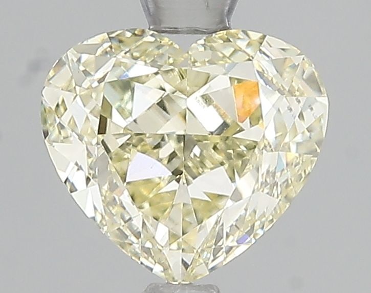 Loose Diamond - HEART 2.0ct Fancy Light Yellow VS1: Loose Diamond - HEART 2.0ct Fancy Light Yellow VS1 Source: This is a real non-mined Diamond that has been grown in a lab Shape: HEART Carats: 2.0 Color: Fancy Light Yellow Certification: IGI Video: