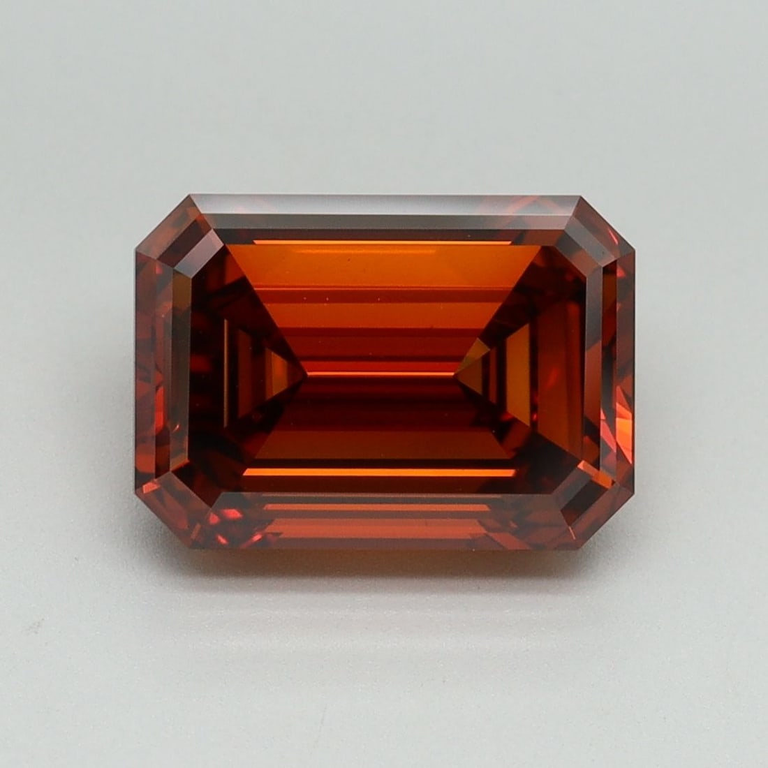 Loose Diamond - EMERALD 3.15ct Fancy Deep Orange VS1: Loose Diamond - EMERALD 3.15ct Fancy Deep Orange VS1 Source: This is a real non-mined Diamond that has been grown in a lab Shape: EMERALD Carats: 3.15 Color: Fancy Deep Orange Certification: IGI Video