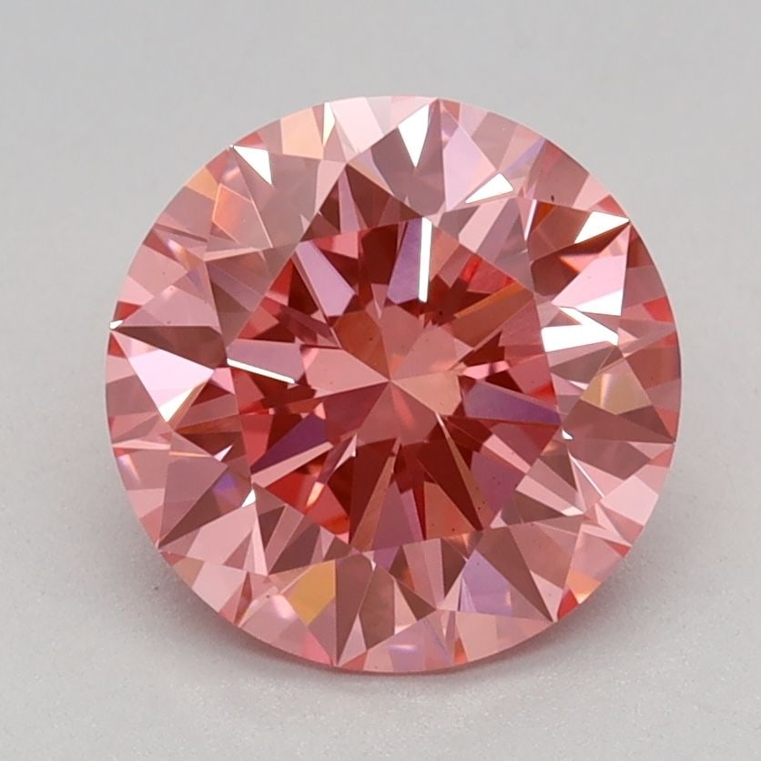 Ideal Loose Diamond - ROUND 1.54ct Fancy Vivid Pink VS2: Ideal Loose Diamond - ROUND 1.54ct Fancy Vivid Pink VS2 Source: This is a real non-mined Diamond that has been grown in a lab Shape: ROUND Carats: 1.54 Color: Fancy Vivid Pink Certification: IGI Video