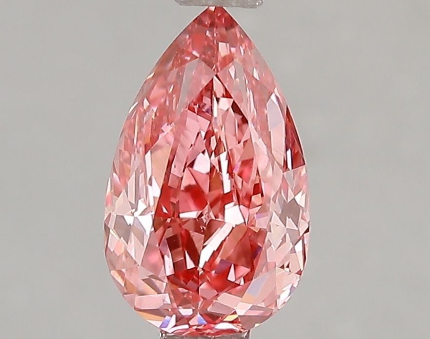 Loose Diamond - PEAR 1.53ct Fancy Vivid Pink VS2: Loose Diamond - PEAR 1.53ct Fancy Vivid Pink VS2 Source: This is a real non-mined Diamond that has been grown in a lab Shape: PEAR Carats: 1.53 Color: Fancy Vivid Pink Certification: IGI Video: