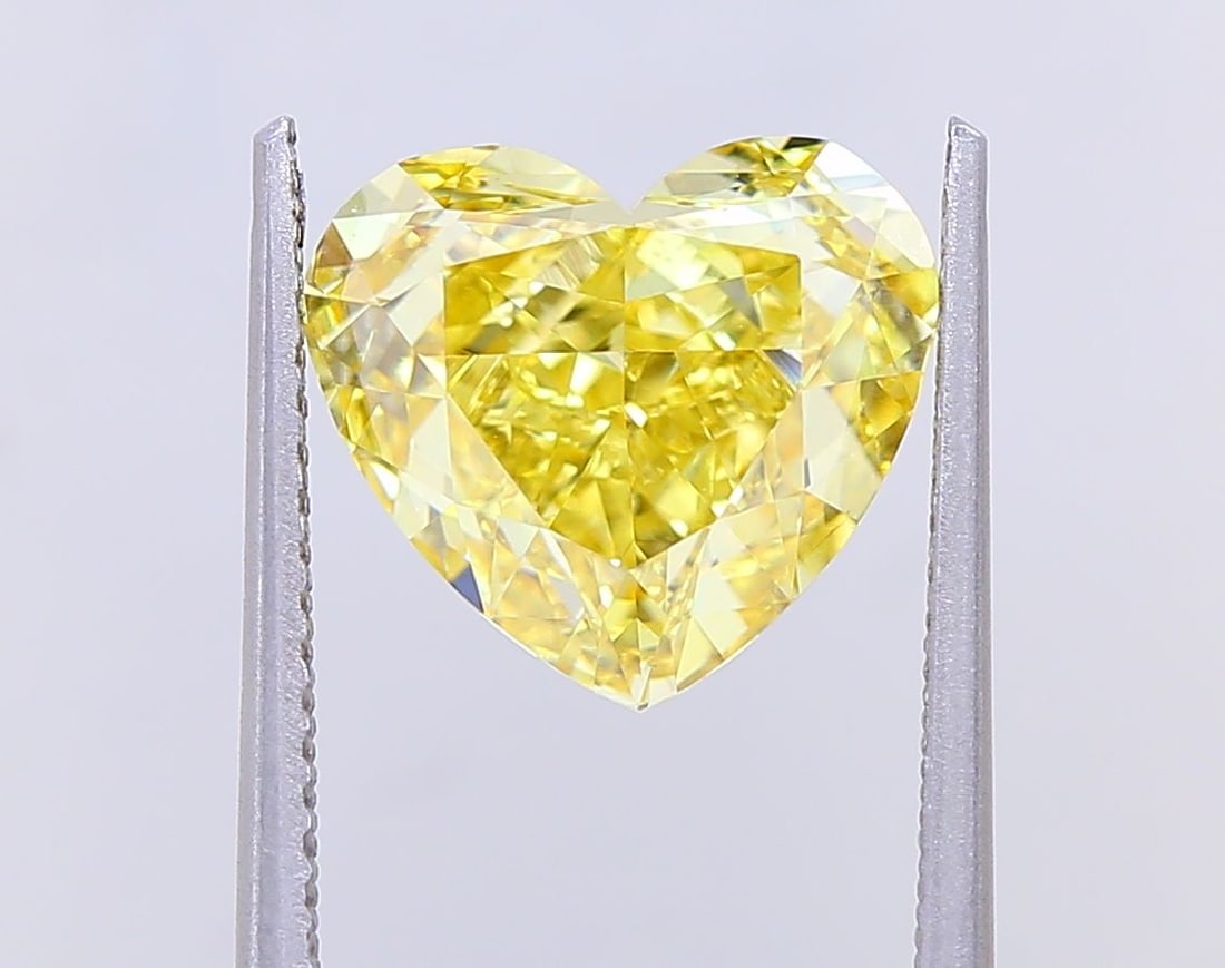 Loose Diamond - HEART 4.0ct Fancy Intense Yellow VS1: Loose Diamond - HEART 4.0ct Fancy Intense Yellow VS1 Source: This is a real non-mined Diamond that has been grown in a lab Shape: HEART Carats: 4.0 Color: Fancy Intense Yellow Certification: IGI Video