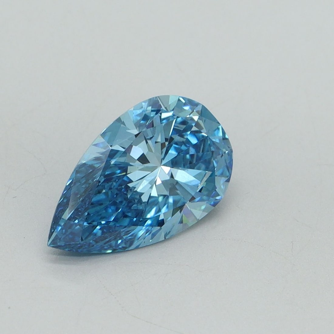 Loose Diamond - PEAR 1.59ct Fancy Vivid Blue VS1: Loose Diamond - PEAR 1.59ct Fancy Vivid Blue VS1 Source: This is a real non-mined Diamond that has been grown in a lab Shape: PEAR Carats: 1.59 Color: Fancy Vivid Blue Certification: IGI Video: Video