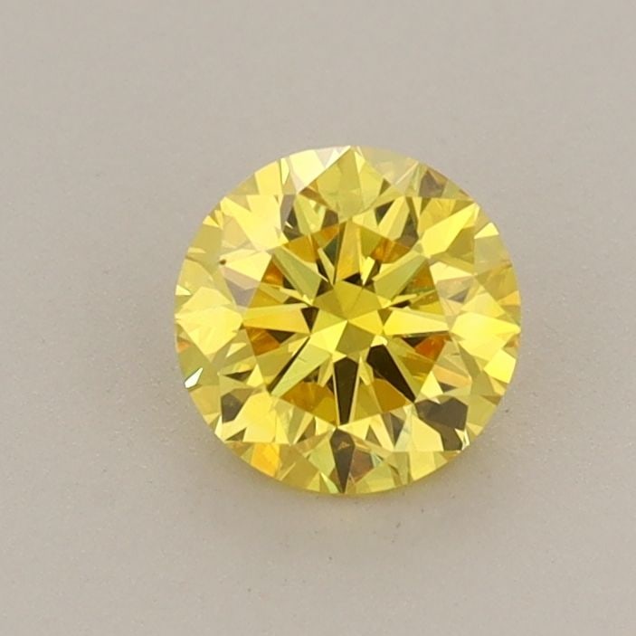 Loose Diamond - ROUND 0.57ct Fancy Vivid Yellow VVS2: Loose Diamond - ROUND 0.57ct Fancy Vivid Yellow VVS2 Source: This is a real non-mined Diamond that has been grown in a lab Shape: ROUND Carats: 0.57 Color: Fancy Vivid Yellow Certification: IGI Video: