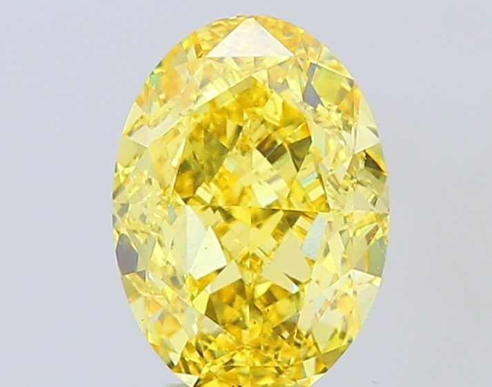 Loose Diamond - OVAL 6.01ct Fancy Vivid Yellow VS2: Loose Diamond - OVAL 6.01ct Fancy Vivid Yellow VS2 Source: This is a real non-mined Diamond that has been grown in a lab Shape: OVAL Carats: 6.01 Color: Fancy Vivid Yellow Certification: IGI Video: