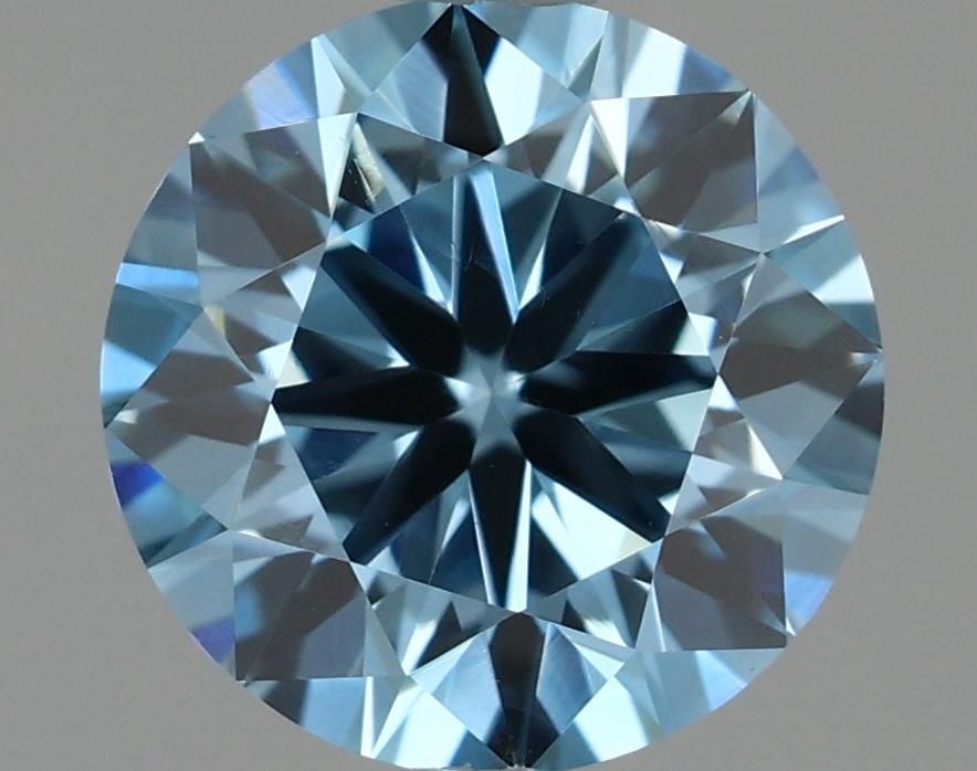 Loose Diamond - ROUND 0.81ct Fancy Vivid Blue VS1: Loose Diamond - ROUND 0.81ct Fancy Vivid Blue VS1 Source: This is a real non-mined Diamond that has been grown in a lab Shape: ROUND Carats: 0.81 Color: Fancy Vivid Blue Certification: IGI Video: