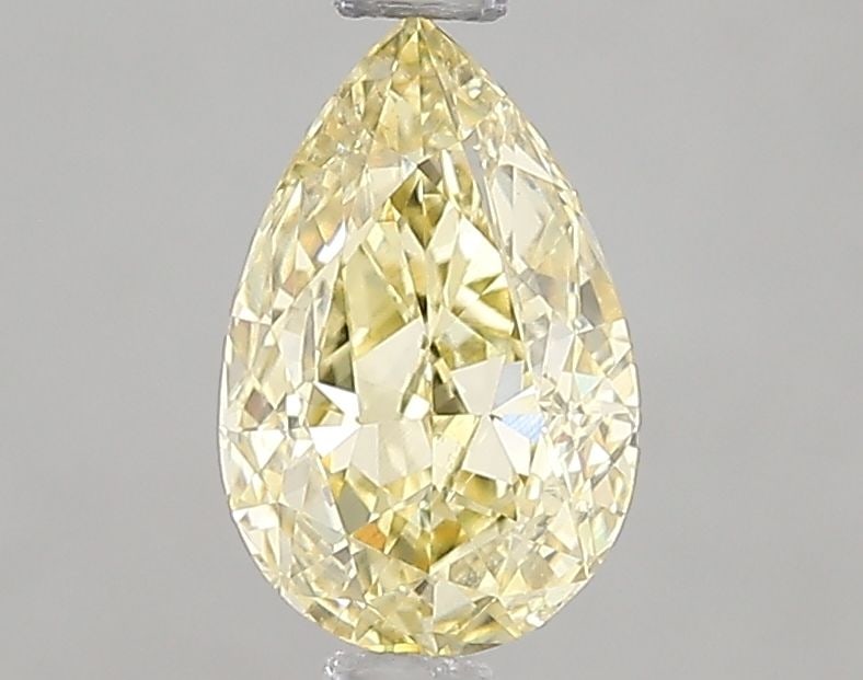 Loose Diamond - PEAR 1.03ct Fancy Yellow VS1: Loose Diamond - PEAR 1.03ct Fancy Yellow VS1 Source: This is a real non-mined Diamond that has been grown in a lab Shape: PEAR Carats: 1.03 Color: Fancy Yellow Certification: IGI Video: