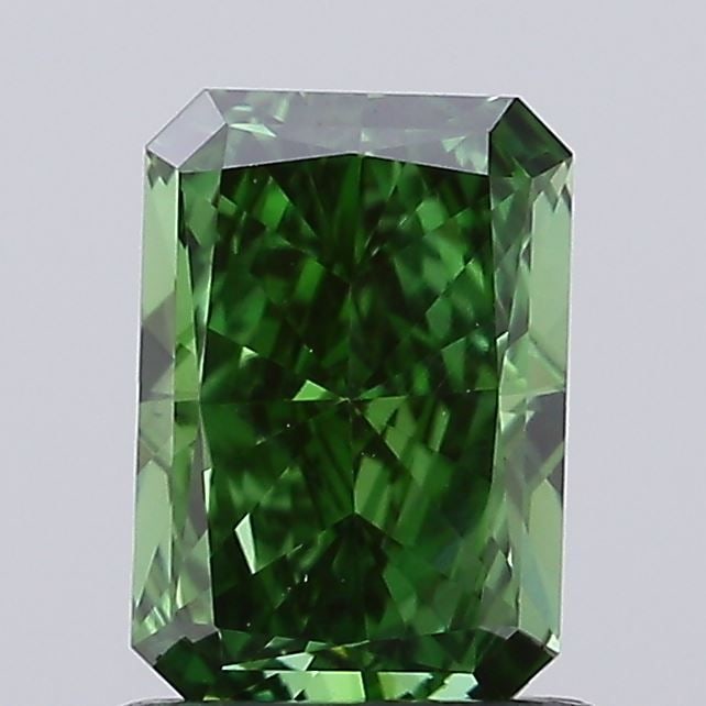 Loose Diamond - RADIANT 0.99ct Fancy Vivid Green VS1: Loose Diamond - RADIANT 0.99ct Fancy Vivid Green VS1 Source: This is a real non-mined Diamond that has been grown in a lab Shape: RADIANT Carats: 0.99 Color: Fancy Vivid Green Certification: IGI Video