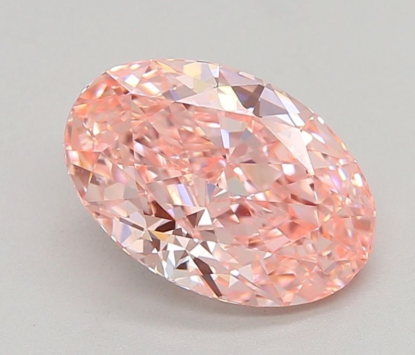 Loose Diamond - OVAL 2.1ct Fancy Vivid Pink VS1: Loose Diamond - OVAL 2.1ct Fancy Vivid Pink VS1 Source: This is a real non-mined Diamond that has been grown in a lab Shape: OVAL Carats: 2.1 Color: Fancy Vivid Pink Certification: IGI Video: