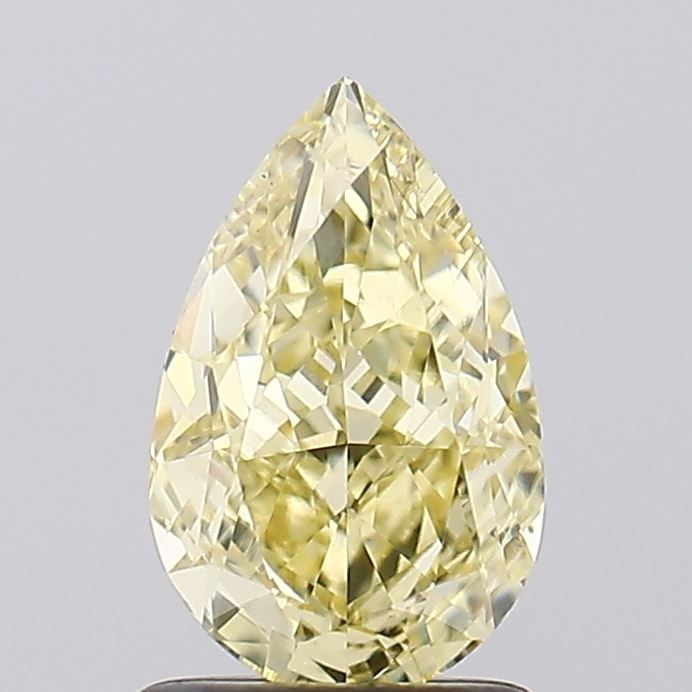 Loose Diamond - PEAR 1.4ct Fancy Yellow VVS2: Loose Diamond - PEAR 1.4ct Fancy Yellow VVS2 Source: This is a real non-mined Diamond that has been grown in a lab Shape: PEAR Carats: 1.4 Color: Fancy Yellow Certification: IGI Video: