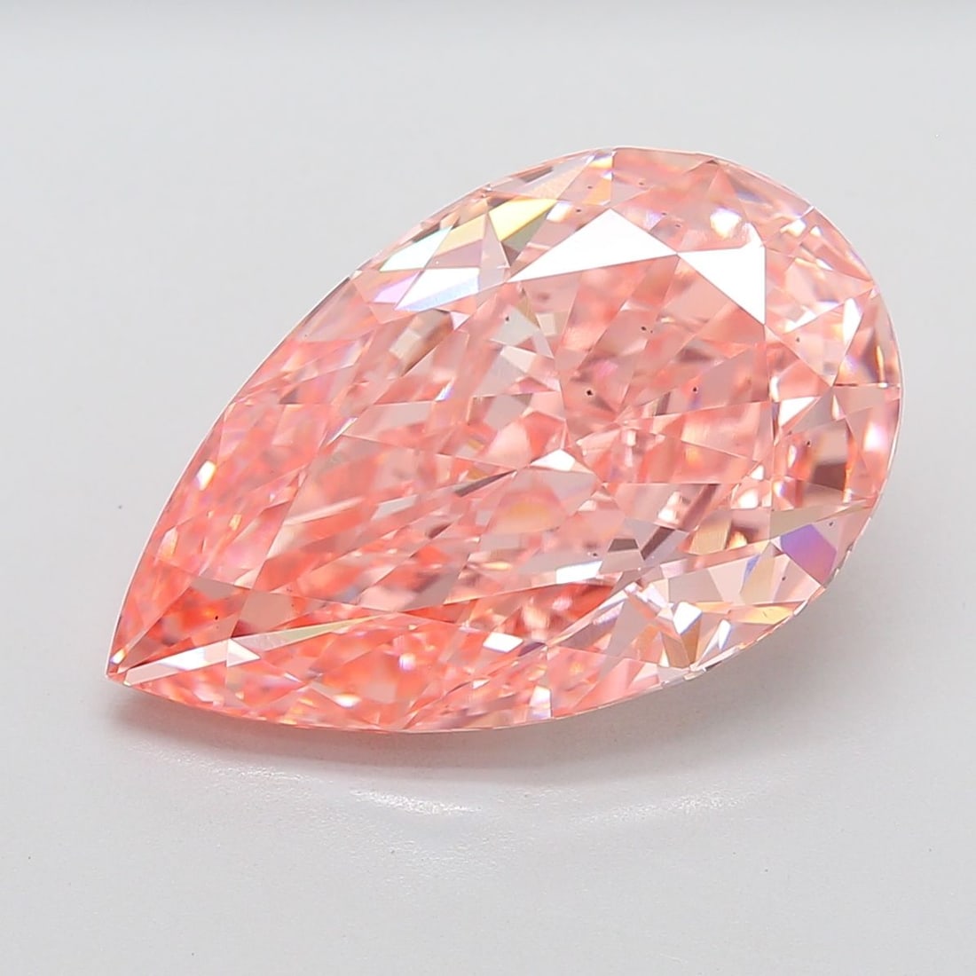Loose Diamond - PEAR 15.06ct Fancy Vivid Pink VS2: Loose Diamond - PEAR 15.06ct Fancy Vivid Pink VS2 Source: This is a real non-mined Diamond that has been grown in a lab Shape: PEAR Carats: 15.06 Color: Fancy Vivid Pink Certification: IGI Video: