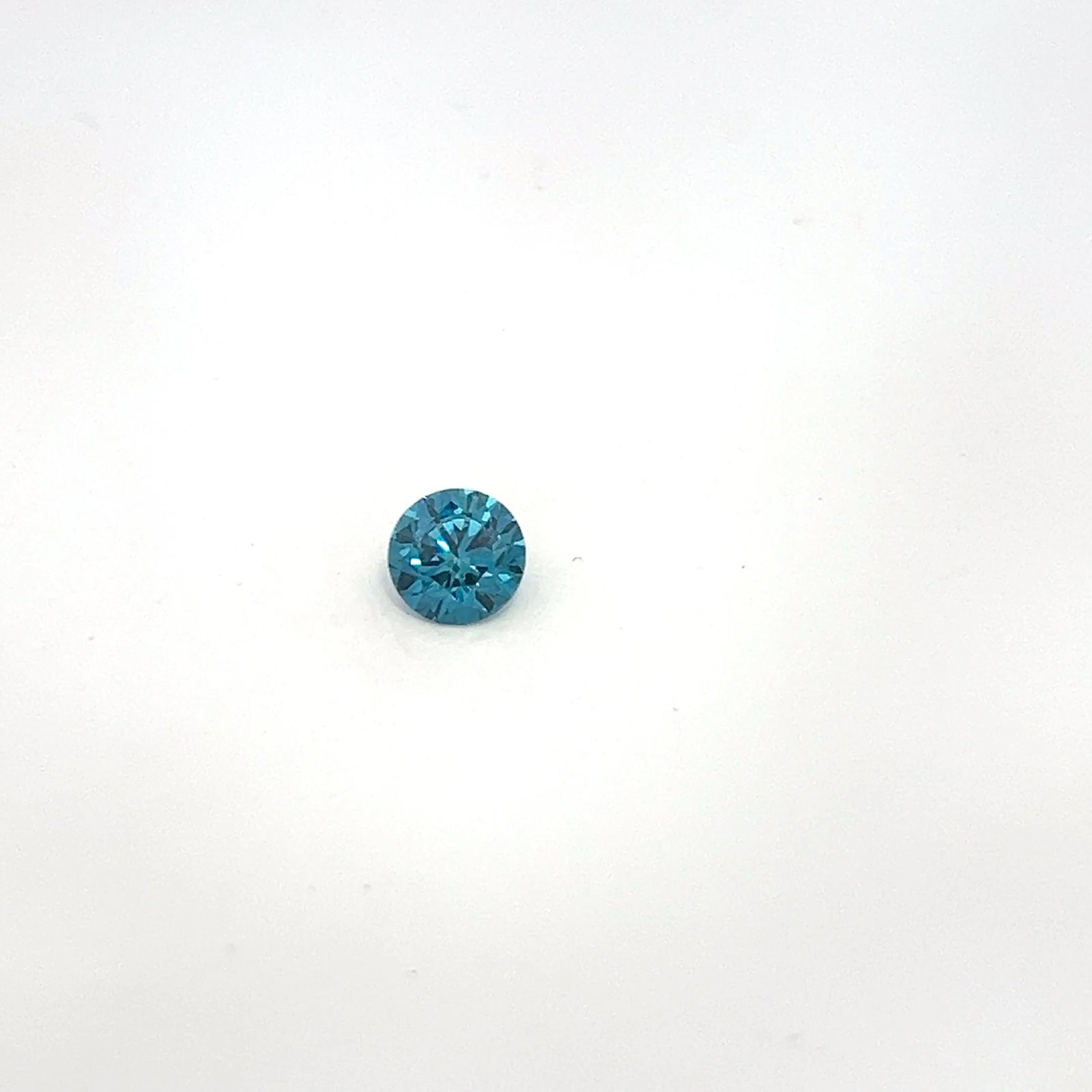 Loose Diamond - ROUND 0.9ct Fancy Blue VS2: Loose Diamond - ROUND 0.9ct Fancy Blue VS2 Source: This is a real non-mined Diamond that has been grown in a lab Shape: ROUND Carats: 0.9 Color: Fancy Blue Certification: NONE PLEASE NOTE: Framed, Lar