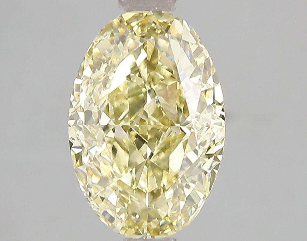 Loose Diamond - OVAL 3.08ct Fancy Intense Yellow VS2: Loose Diamond - OVAL 3.08ct Fancy Intense Yellow VS2 Source: This is a real non-mined Diamond that has been grown in a lab Shape: OVAL Carats: 3.08 Color: Fancy Intense Yellow Certification: IGI Video