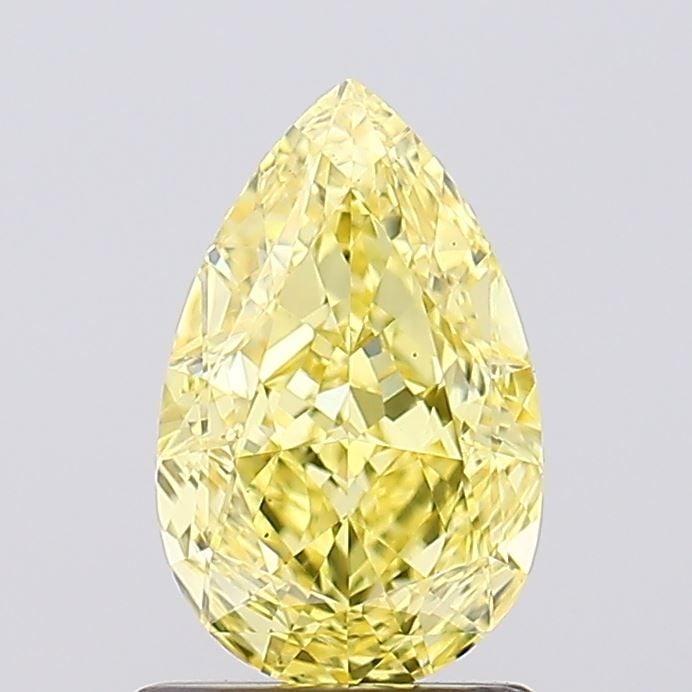 Loose Diamond - PEAR 1.32ct Fancy Vivid Yellow VS2: Loose Diamond - PEAR 1.32ct Fancy Vivid Yellow VS2 Source: This is a real non-mined Diamond that has been grown in a lab Shape: PEAR Carats: 1.32 Color: Fancy Vivid Yellow Certification: IGI Video: