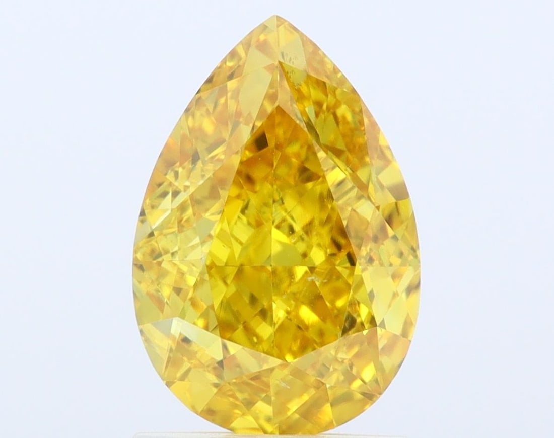 Loose Diamond - PEAR 1.64ct Fancy Vivid Yellow VS2: Loose Diamond - PEAR 1.64ct Fancy Vivid Yellow VS2 Source: This is a real non-mined Diamond that has been grown in a lab Shape: PEAR Carats: 1.64 Color: Fancy Vivid Yellow Certification: IGI Video: