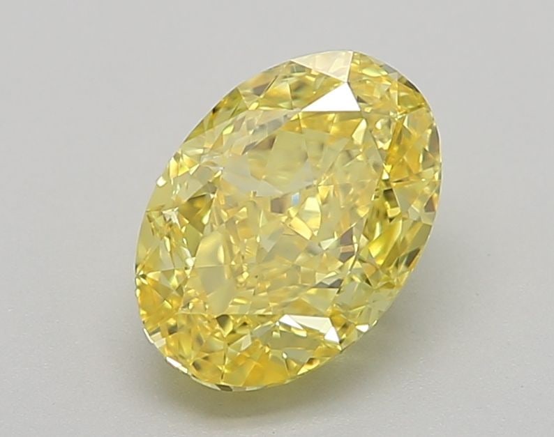 Loose Diamond - OVAL 1.54ct Fancy Vivid Yellow VVS2: Loose Diamond - OVAL 1.54ct Fancy Vivid Yellow VVS2 Source: This is a real non-mined Diamond that has been grown in a lab Shape: OVAL Carats: 1.54 Color: Fancy Vivid Yellow Certification: IGI Video: