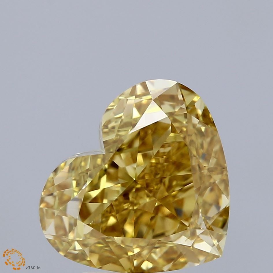 Loose Diamond - HEART 5.09ct Fancy Vivid Yellow VS1: Loose Diamond - HEART 5.09ct Fancy Vivid Yellow VS1 Source: This is a real non-mined Diamond that has been grown in a lab Shape: HEART Carats: 5.09 Color: Fancy Vivid Yellow Certification: IGI Video: