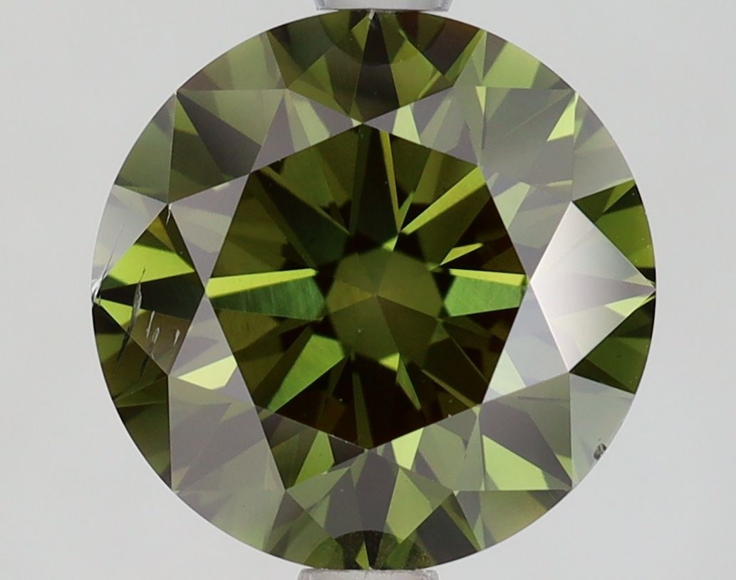 Loose Diamond - ROUND 2.65ct Fancy Green SI2: Loose Diamond - ROUND 2.65ct Fancy Green SI2 Source: This is a real non-mined Diamond that has been grown in a lab Shape: ROUND Carats: 2.65 Color: Fancy Green Certification: NONE Video: