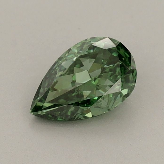 Loose Diamond - PEAR 0.63ct Fancy Vivid Green VVS2: Loose Diamond - PEAR 0.63ct Fancy Vivid Green VVS2 Source: This is a real non-mined Diamond that has been grown in a lab Shape: PEAR Carats: 0.63 Color: Fancy Vivid Green Certification: IGI Video: