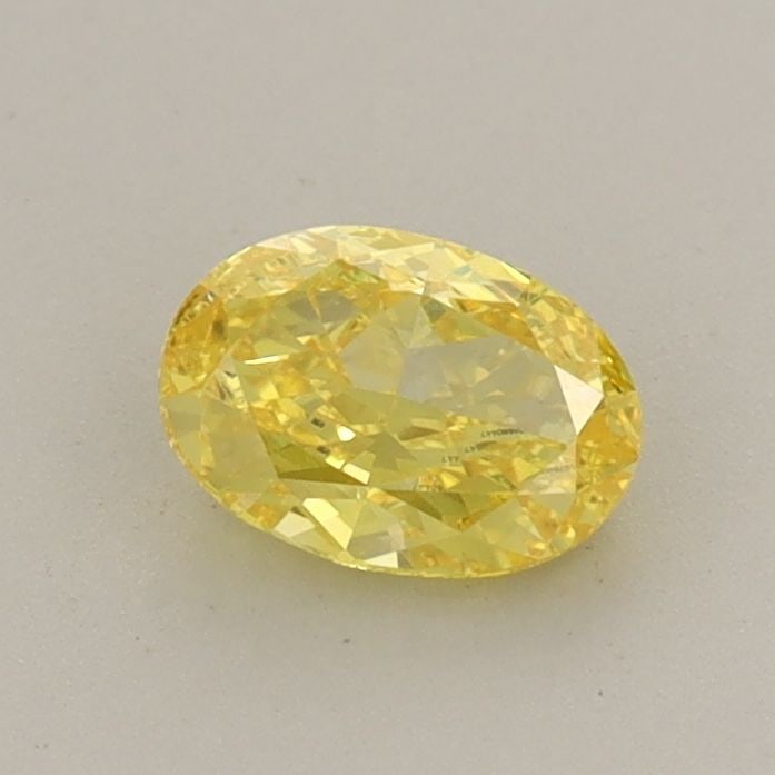 Loose Diamond - OVAL 0.57ct Fancy Vivid Yellow VS1: Loose Diamond - OVAL 0.57ct Fancy Vivid Yellow VS1 Source: This is a real non-mined Diamond that has been grown in a lab Shape: OVAL Carats: 0.57 Color: Fancy Vivid Yellow Certification: IGI Video: