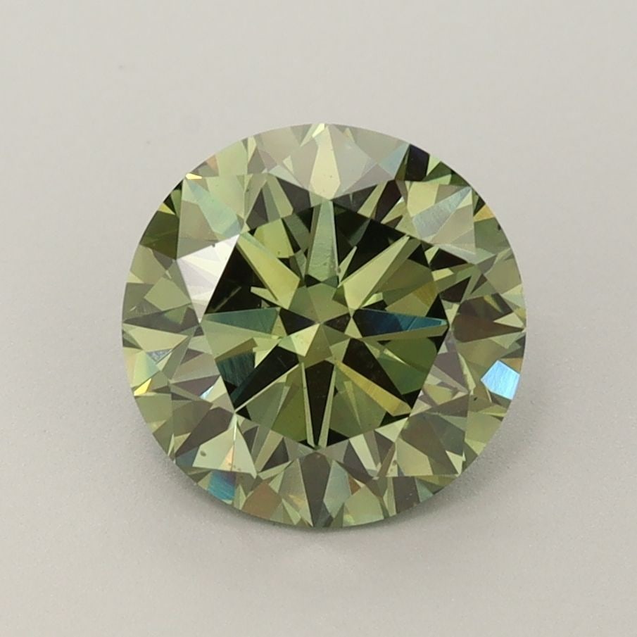 Loose Diamond - ROUND 2.01ct Fancy Vivid Green VS2: Loose Diamond - ROUND 2.01ct Fancy Vivid Green VS2 Source: This is a real non-mined Diamond that has been grown in a lab Shape: ROUND Carats: 2.01 Color: Fancy Vivid Green Certification: IGI Video:
