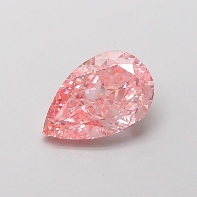 Loose Diamond - PEAR 0.8ct Fancy Vivid Pink VVS2: Loose Diamond - PEAR 0.8ct Fancy Vivid Pink VVS2 Source: This is a real non-mined Diamond that has been grown in a lab Shape: PEAR Carats: 0.8 Color: Fancy Vivid Pink Certification: IGI Video:
