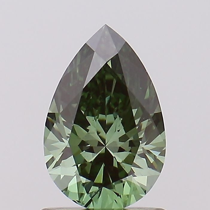 Loose Diamond - PEAR 0.9ct Fancy Vivid Green SI1: Loose Diamond - PEAR 0.9ct Fancy Vivid Green SI1 Source: This is a real non-mined Diamond that has been grown in a lab Shape: PEAR Carats: 0.9 Color: Fancy Vivid Green Certification: NONE Video: