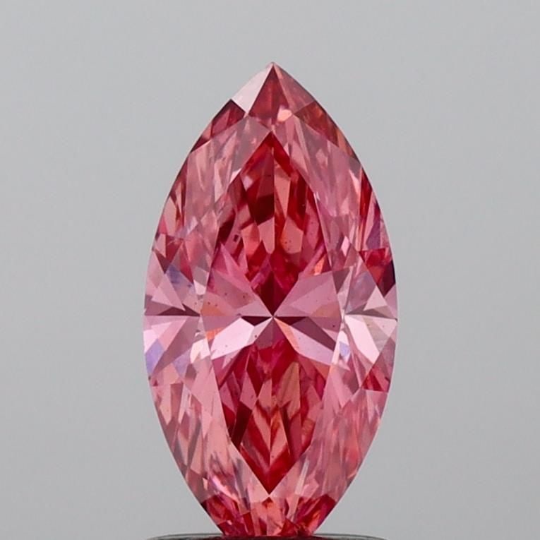 Loose Diamond - MARQUISE 1.06ct Fancy Vivid Pink SI1: Loose Diamond - MARQUISE 1.06ct Fancy Vivid Pink SI1 Source: This is a real non-mined Diamond that has been grown in a lab Shape: MARQUISE Carats: 1.06 Color: Fancy Vivid Pink Certification: IGI Video