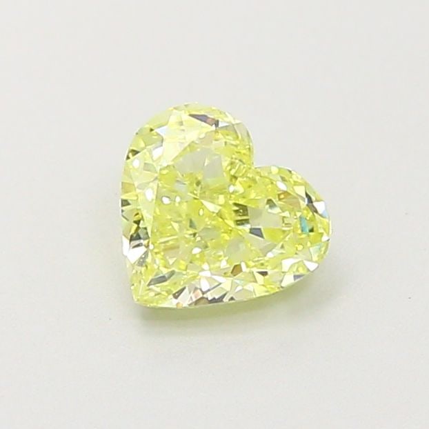 Loose Diamond - HEART 0.58ct Fancy Yellow VVS1: Loose Diamond - HEART 0.58ct Fancy Yellow VVS1 Source: This is a real non-mined Diamond that has been grown in a lab Shape: HEART Carats: 0.58 Color: Fancy Yellow Certification: IGI Video: