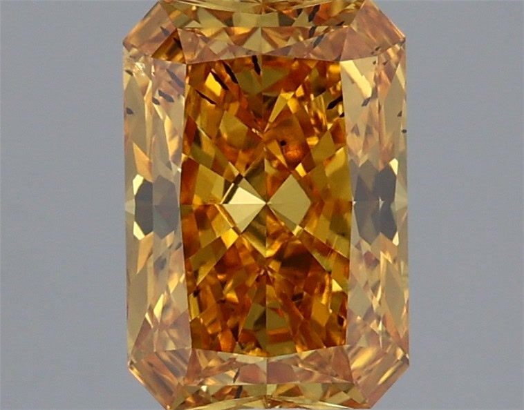 Loose Diamond - RADIANT 1.35ct Fancy Vivid Yellow SI1: Loose Diamond - RADIANT 1.35ct Fancy Vivid Yellow SI1 Source: This is a real non-mined Diamond that has been grown in a lab Shape: RADIANT Carats: 1.35 Color: Fancy Vivid Yellow Certification: IGI Vid