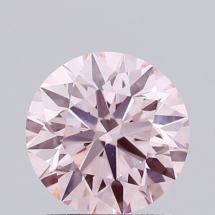 Ideal Loose Diamond - ROUND 1.77ct Fancy Vivid Pink VS1: Ideal Loose Diamond - ROUND 1.77ct Fancy Vivid Pink VS1 Source: This is a real non-mined Diamond that has been grown in a lab Shape: ROUND Carats: 1.77 Color: Fancy Vivid Pink Certification: IGI Video