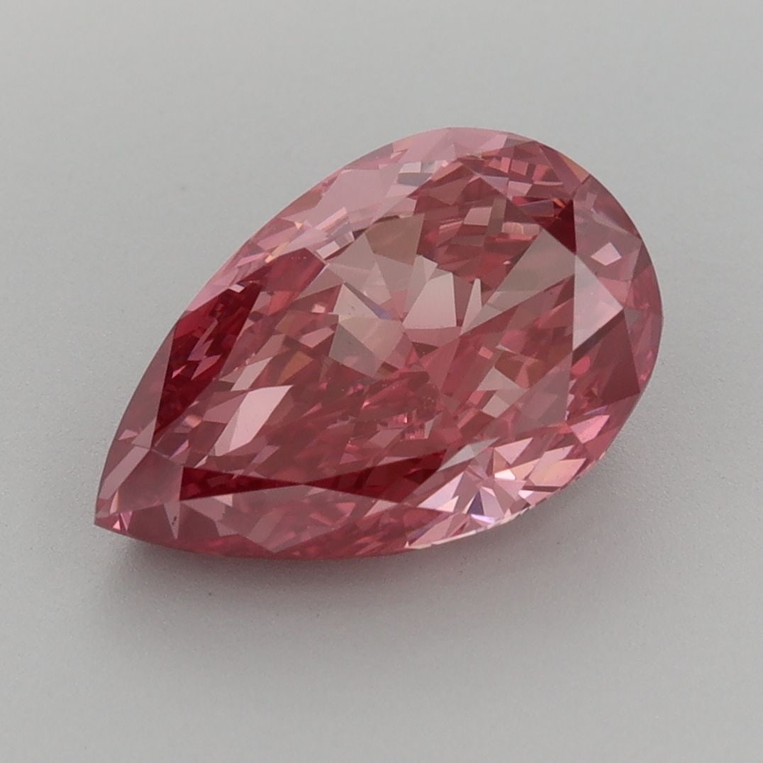 Loose Diamond - PEAR 3.14ct Fancy Vivid Pink VVS2: Loose Diamond - PEAR 3.14ct Fancy Vivid Pink VVS2 Source: This is a real non-mined Diamond that has been grown in a lab Shape: PEAR Carats: 3.14 Color: Fancy Vivid Pink Certification: IGI Video: