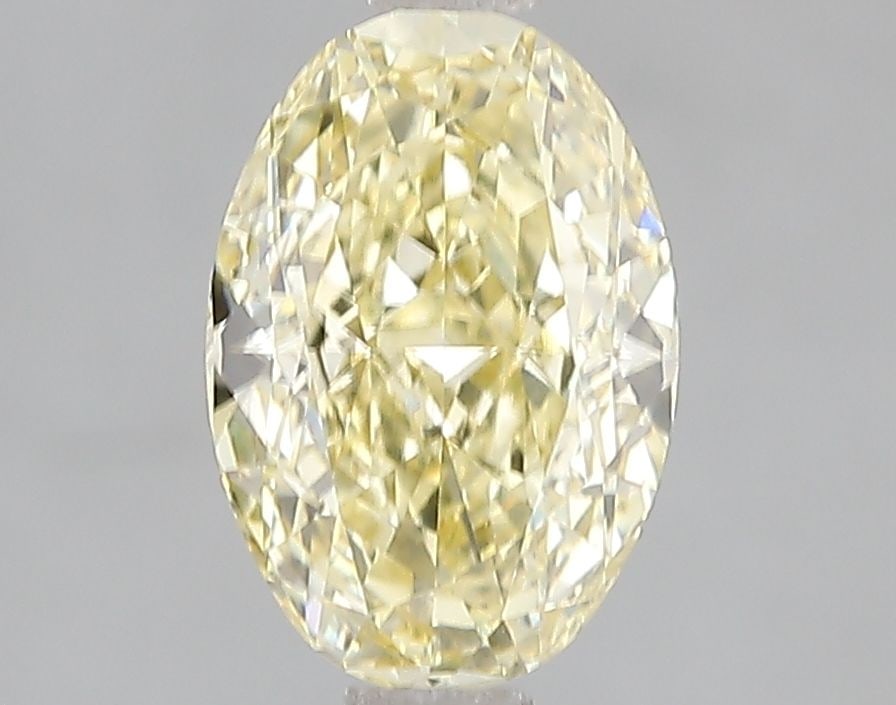 Loose Diamond - OVAL 1.98ct Fancy Intense Yellow VVS2: Loose Diamond - OVAL 1.98ct Fancy Intense Yellow VVS2 Source: This is a real non-mined Diamond that has been grown in a lab Shape: OVAL Carats: 1.98 Color: Fancy Intense Yellow Certification: IGI Vide
